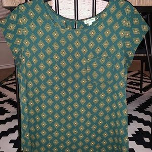 Loose blouse with side pocket